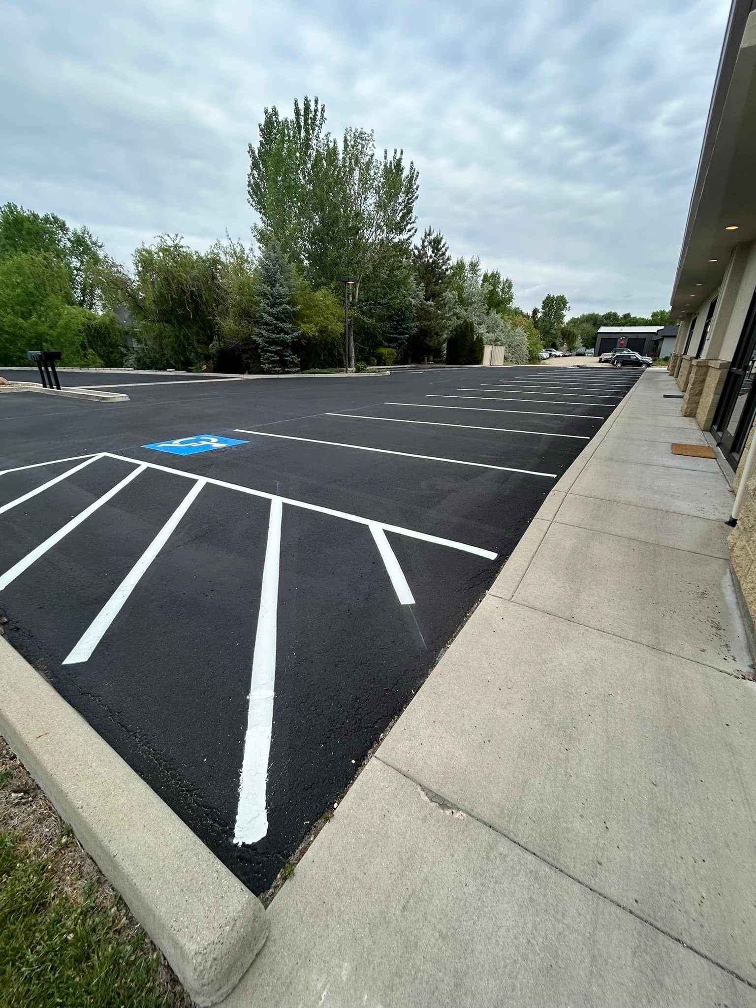 Fresh striping detail on a commercial parking lot by Supreme Seal Coat in Meridian, Idaho