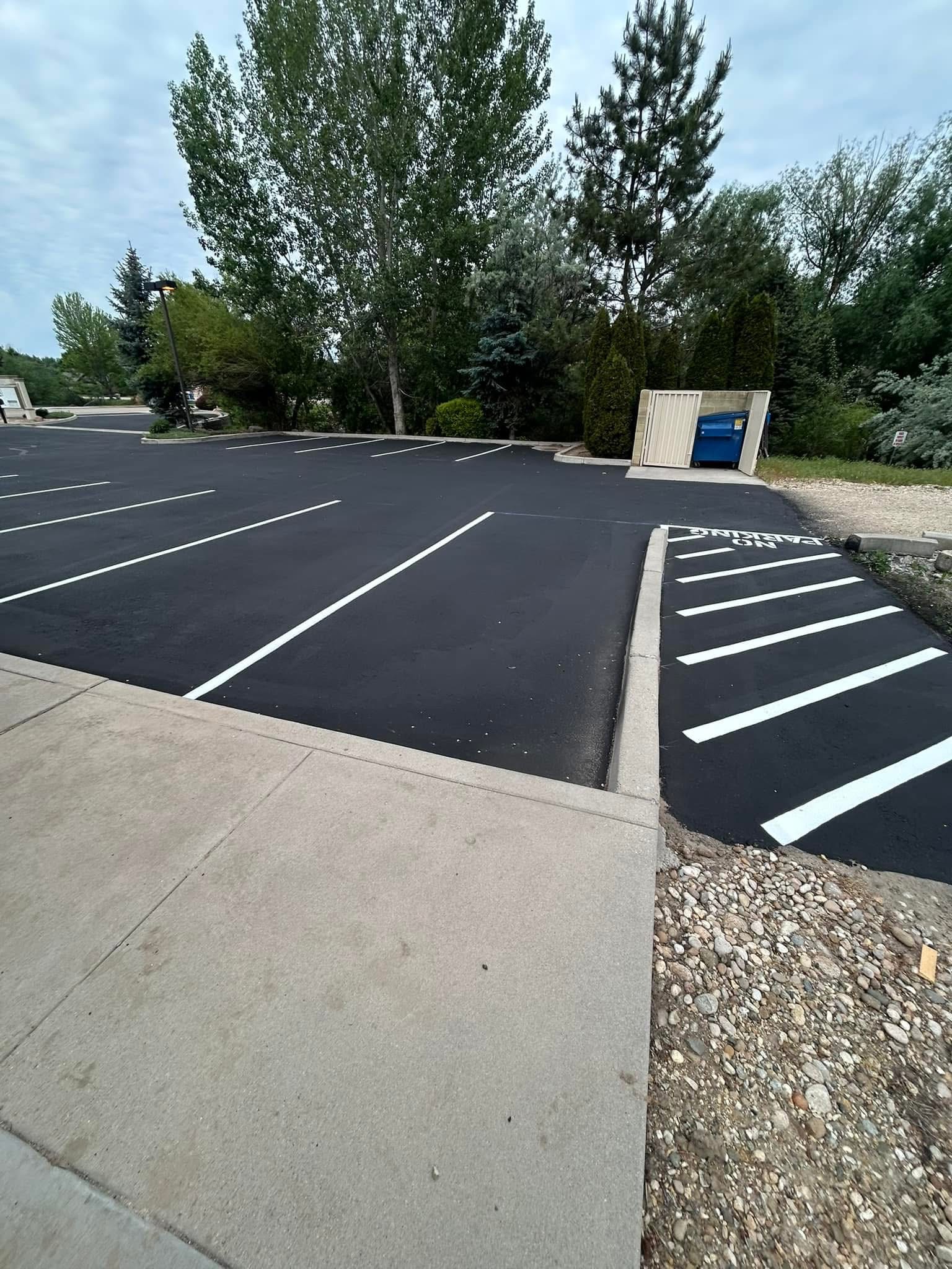 Aerial view of Supreme Seal Coat crew working on an asphalt project