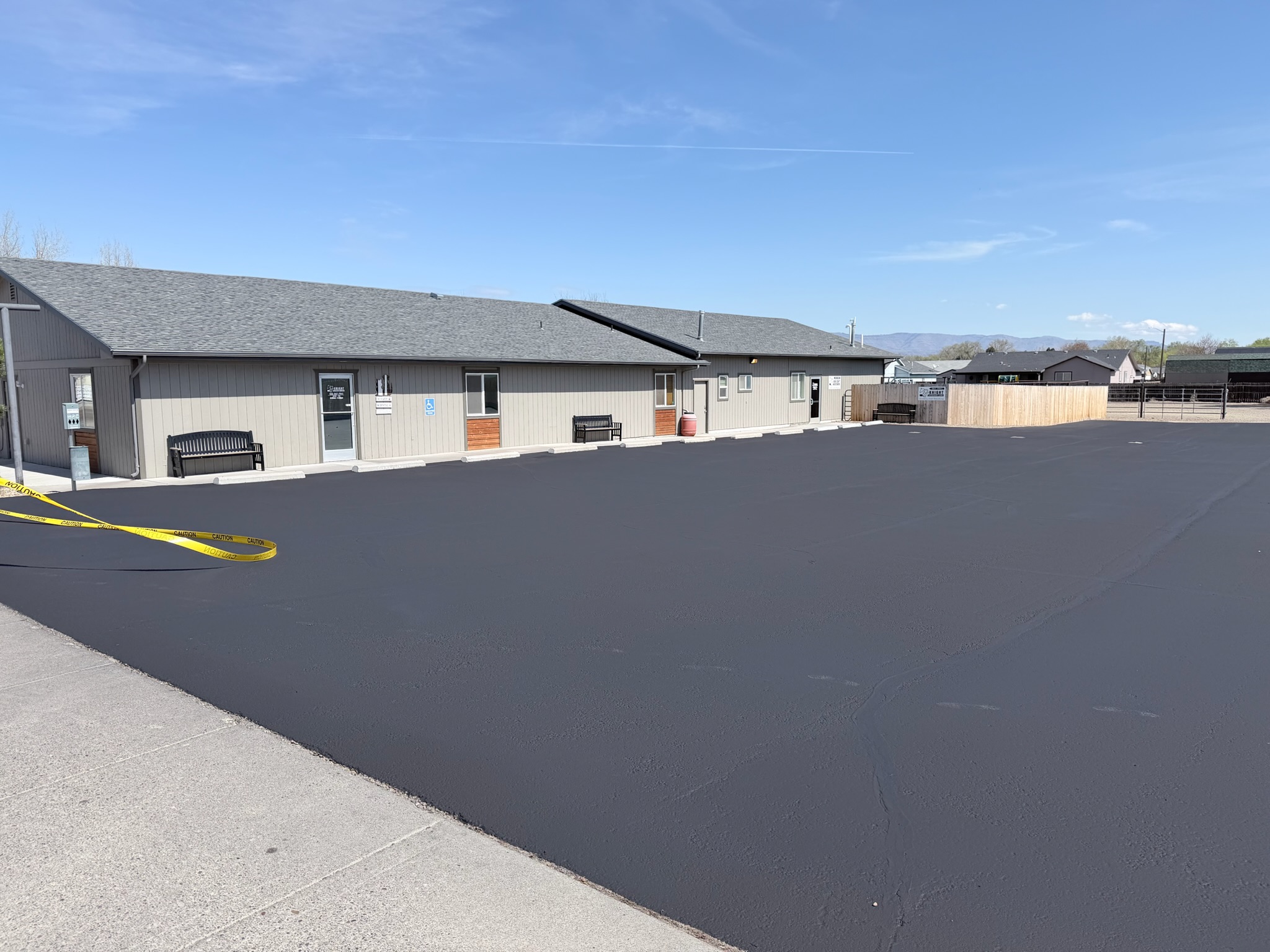 Warehouse parking lot freshly sealcoated